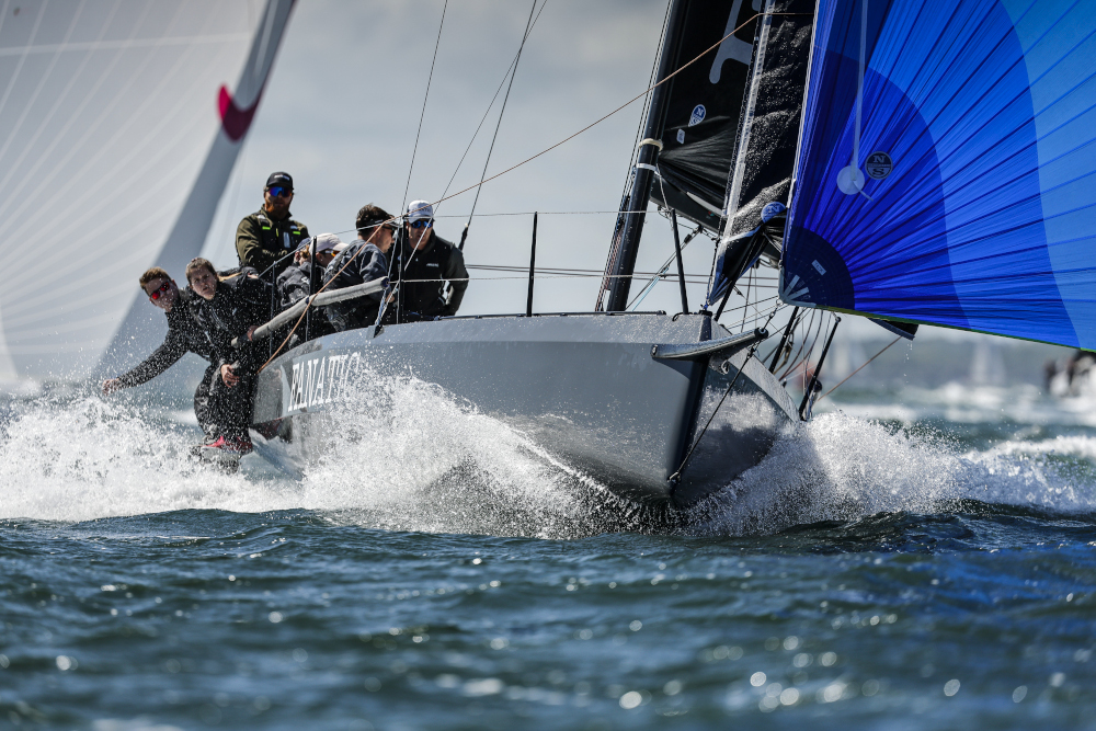 Cape 31 sailing downwind with big bow wave